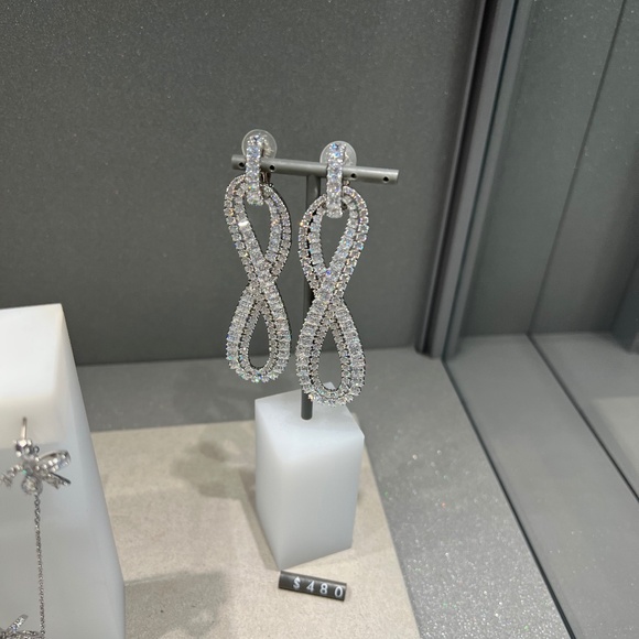 New! SWAROVSKI Hyperbola Infiniti Rhodium plated earrings - Picture 1 of 2